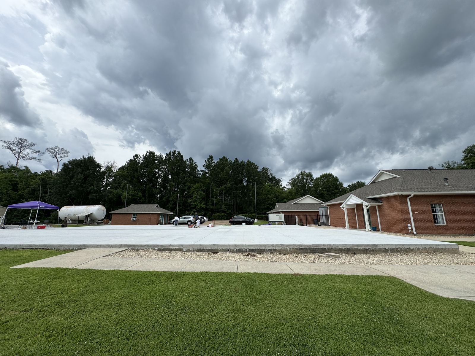 Ornate gilded gold baroque mirrors on restaurant wall with damask wallpaper