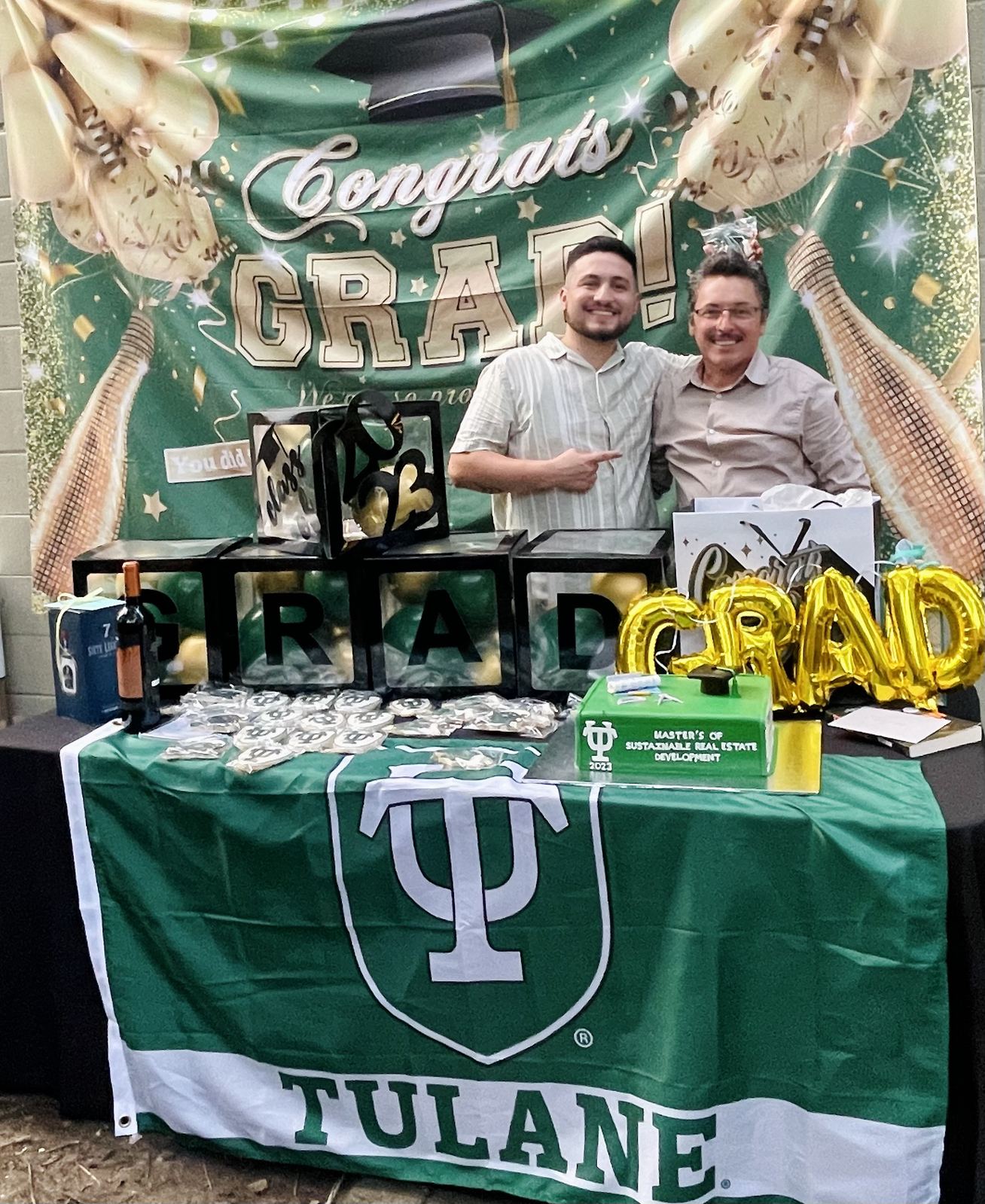 Historic shotgun porch with custom ironwork railing and restored millwork