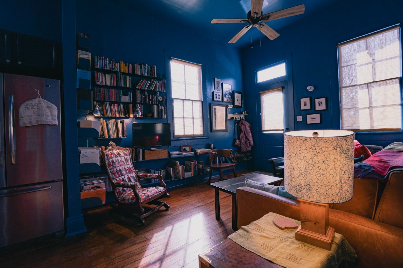 Close-up of custom cassette tape ceramic tile backsplash with steel counter