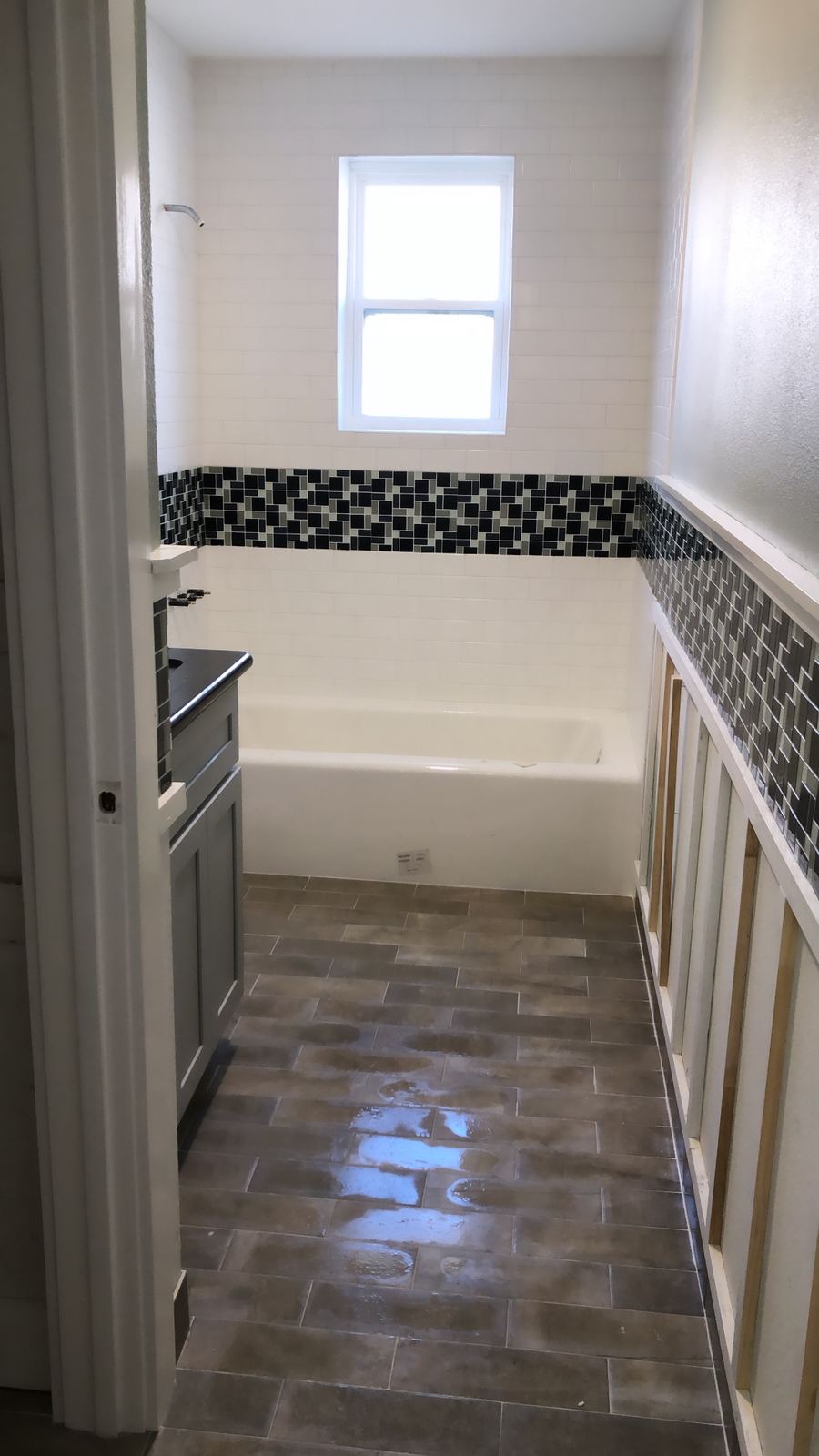 Kitchen wide shot with open shelving and pendant lighting