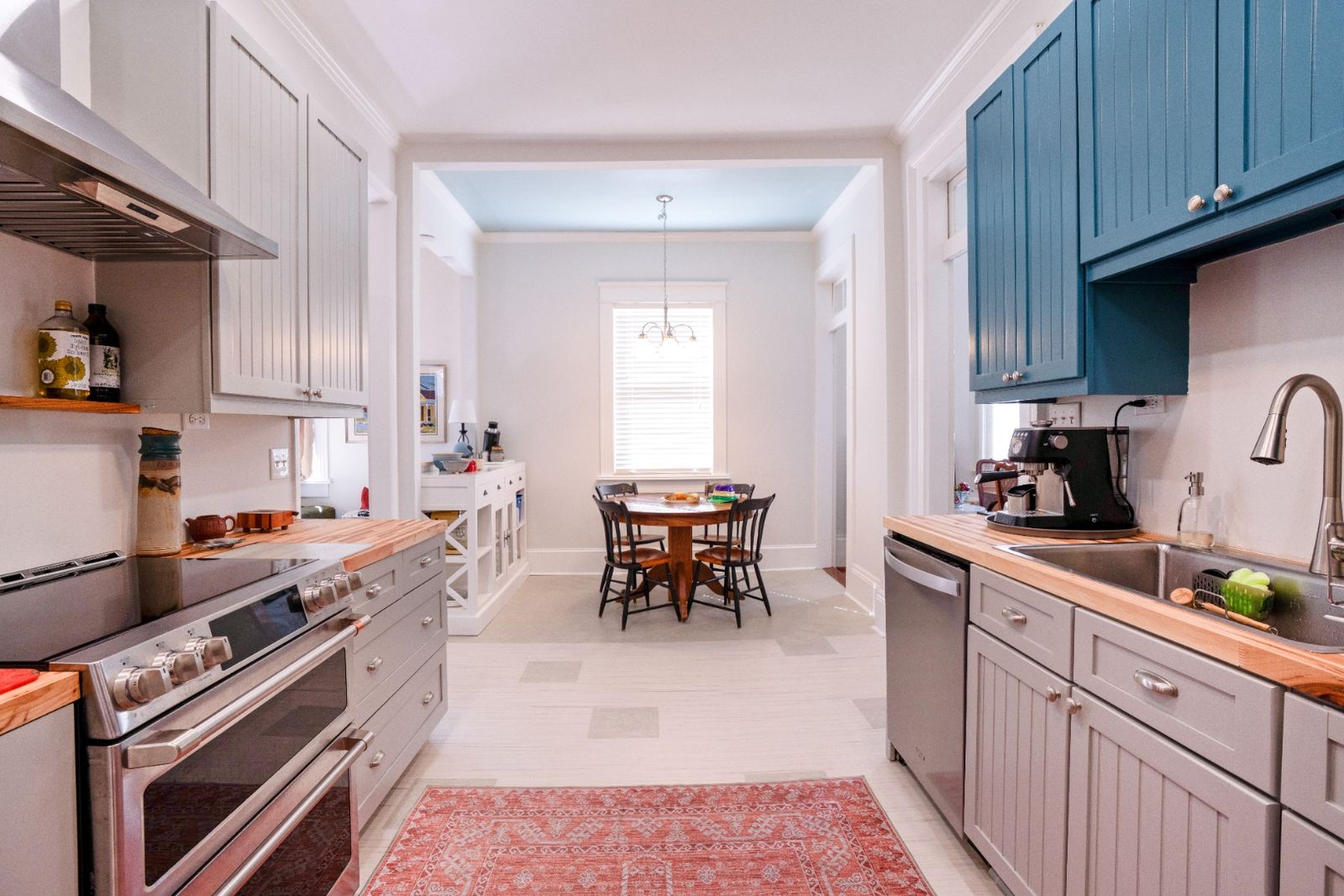Kitchen open to dining room through classic doorway